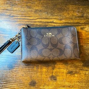 I am selling a small Coach wristlet!